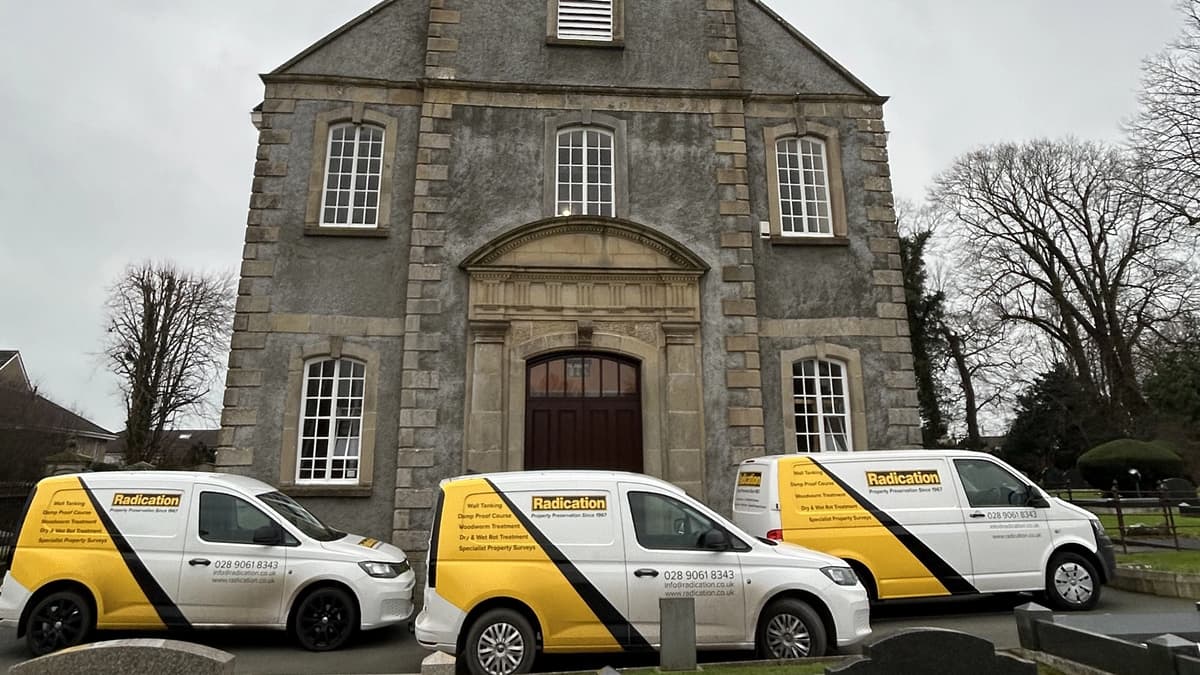 St John's Parish Church, Moira, with Radication Ltd vans on site for bell tower woodworm treatment