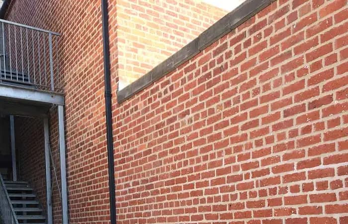 External brickwork treated with silicone water repellent