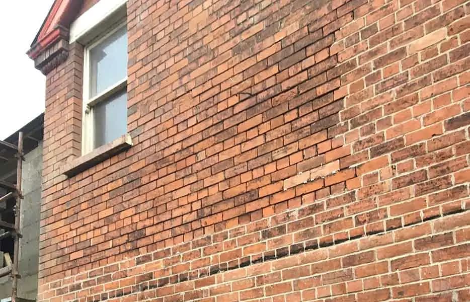 Masonry wall after waterproofing treatment